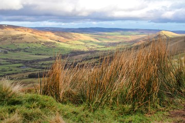 Countryside english landscape rural view across fields from mam tor and the great ridge in the peak district