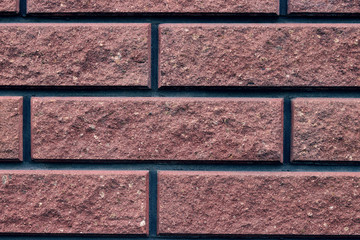 Red brick wall texture grunge background may use to interior design
