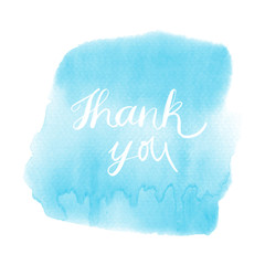 Thank you hand drawn lettering on blue watercolor