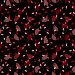 Elegant black seamless pattern with chaotic sparks in different shades of red and pink