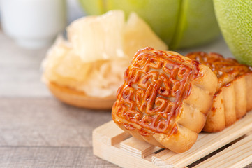 fresh and peeled pomelo(shaddock), grapefruit with slices and mooncake in mid-autumn festival(moon festival)