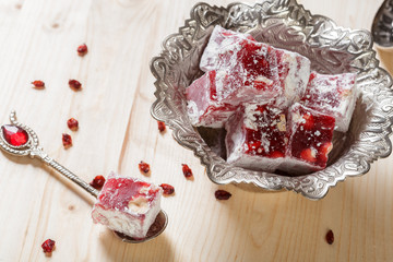 Turkish delight on a wooden table.