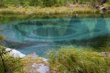 Fototapeta na wymiar Geyser lake in the Altai