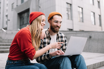 Collaborate, business, teamwork. Creative freelancers planning startup project using laptop...