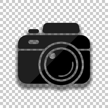Photo camera, simple icon. Black glass icon with soft shadow on