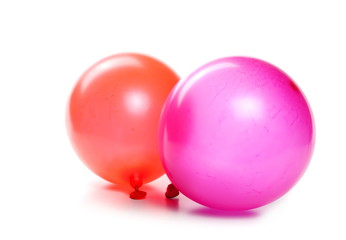 Round, inflated balloons isolated on white background