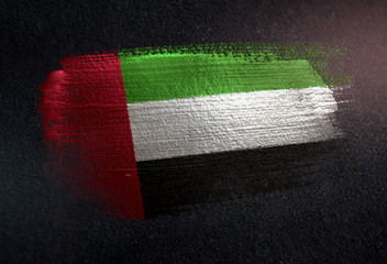 United Arab Emirates Flag Made of Metallic Brush Paint on Grunge Dark Wall