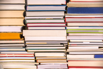 Piles of books background, back to school, college, university concept