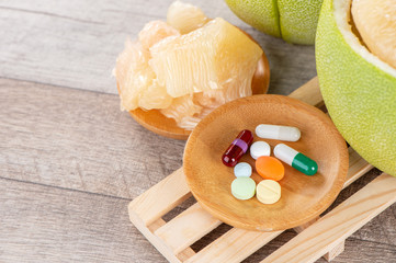 fresh and peeled pomelo(shaddock), grapefruit with drug, concept of drug interatcions