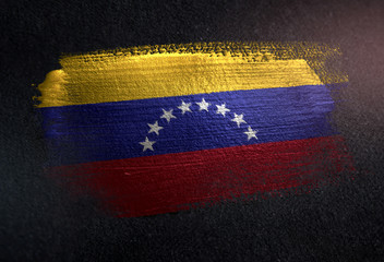 Venezuela Flag Made of Metallic Brush Paint on Grunge Dark Wall - 218928487