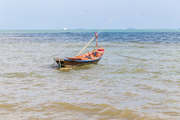 Fototapeta premium The ship floating in the sea