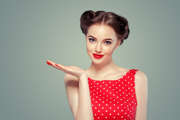Pinup woman beauty portrait vintage retro girl model in polka dot dress
