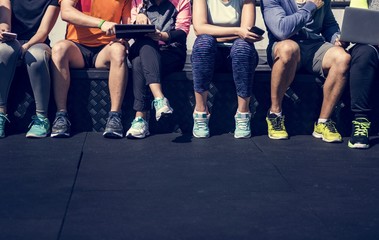 Group of diverse athletes sitting together