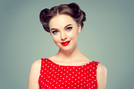 Pinup woman beauty portrait vintage retro girl model in polka dot dress