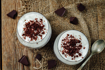 Chocolate cookies greek yogurt parfait in the glasses