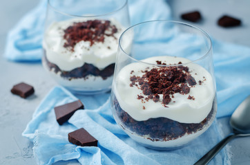 Chocolate cookies greek yogurt parfait in the glasses