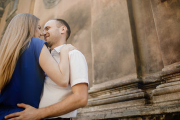 Beautiful happy couple embracing in the city.  