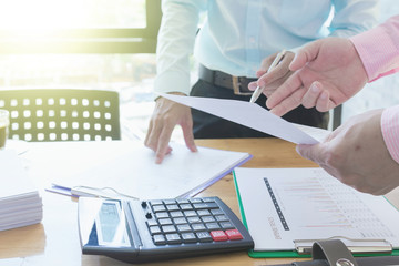 Fototapeta premium Administrator business man financial inspector and secretary making report, calculating or checking balance. - Business Concept
