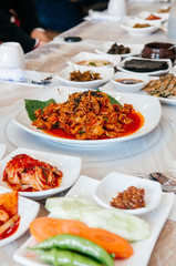 Kimchi pork, Pajeon Korean pancake and small portion of side dishes