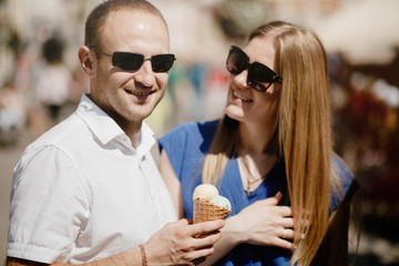Beautiful happy couple embracing in the city.  