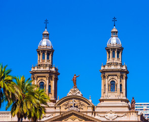 Fototapeta na wymiar View of the cathedral, Santiago, Chile. Isolated on blue background. Copy space for text.