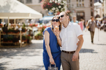 Beautiful happy couple embracing in the city.  