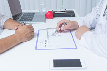 Doctor and patient are discussing something.- Health care concept