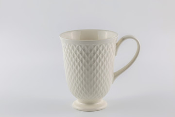 White coffee cup on white