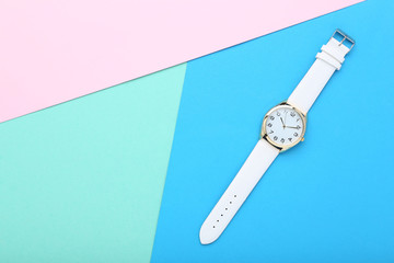 Wrist watch on colorful background