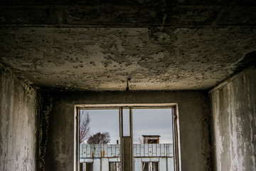 Fototapeta na wymiar Interior of an old destroyed house