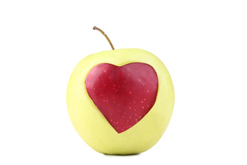 Plakat Green apple with cutout heart shape on white background