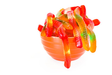 A bowl full of gummy worms