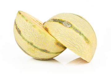 Group of two halves of fresh melon cantaloupe variety one sliced isolated on white background
