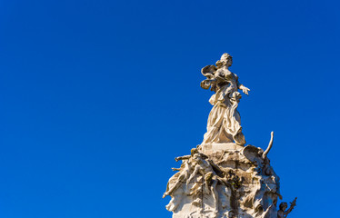 View of the monument against the blue sky, Buenos Aires, Argentina. Copy space for text. Isolated on blue background.