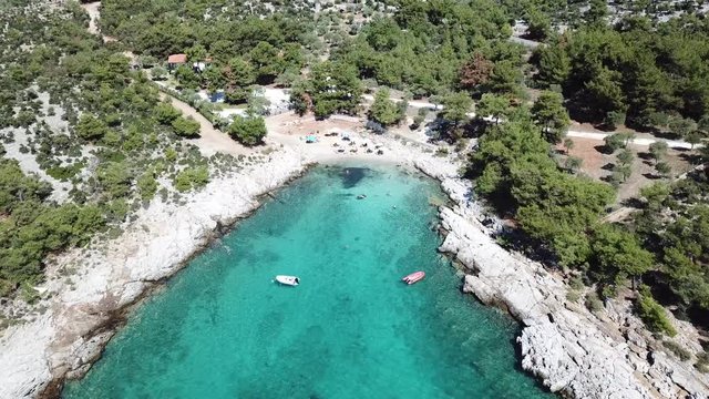 Drone Aerial Footage of the Beautiful samll Beach on the Greek Island of Thassos in the Aegean Sea with turquoise waters - Aerial View, Greece