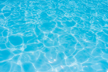 Fototapeta na wymiar water in swimming pool rippled water detail