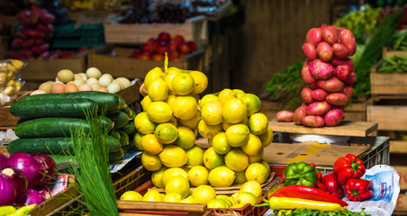 Fruit and vegetables on the counter, local market, Puerto Montt, Chile.