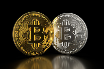 Bitcoin. Golden and silver coins with bitcoin symbol isolated on black background. Digital currency. Block chain. Cryptocurrency.