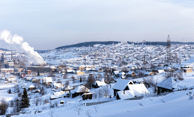 Obraz premium Winter Russian village on a bright sunny day