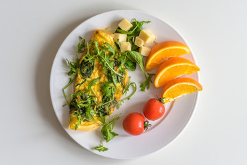 Breakfast omelette with vegetables and cheese
