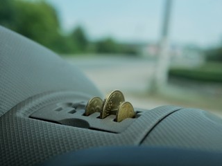 Polonne / Ukraine - 13 August 2018: coins in the car