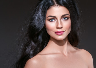 Fototapeta premium Beautiful Black hair woman beauty portrait. Amazing hairstyle female long curly shine hair.