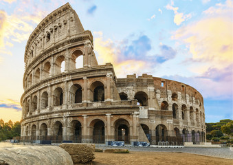 Naklejka na ściany i meble Colosseum in Rome at the Sunrise Time - Colosseum is one of the main travel attractions - The Main symbol of Rome