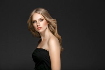Fototapeta na wymiar Beautiful Woman Face Portrait Beauty Skin Care Concept with long blonde hair 