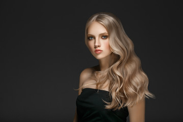 Naklejka premium Beautiful Woman Face Portrait Beauty Skin Care Concept with long blonde hair 