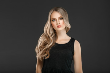 Naklejka premium Beautiful Woman Face Portrait Beauty Skin Care Concept with long blonde hair 