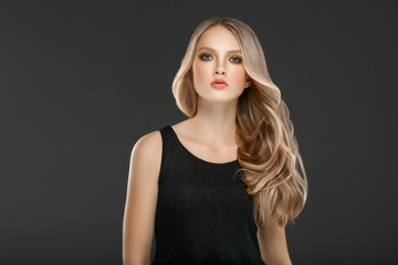 Naklejka premium Beautiful Woman Face Portrait Beauty Skin Care Concept with long blonde hair 