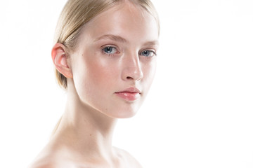 Closeup woman face with healthy skin beauty eyes and lips blonde beautiful girl