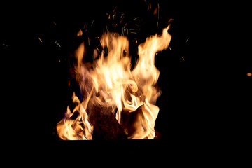 Fire flames on a black background. The fire burns on a black background.