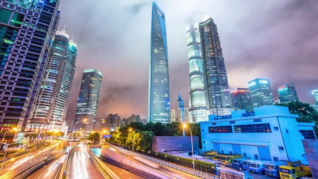 timelapse of busy traffic road with city skyline in shanghai china
